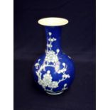 Japanese blue & white bottleneck vase with flared rim and signature panel to the base (23cm high)