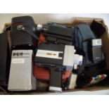 Box of camera accessories including cases, flash guns, cine cameras etc