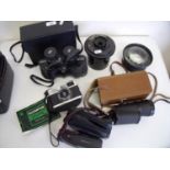 Selection of various vintage cameras and camera equipment, a large magnifying lens etc