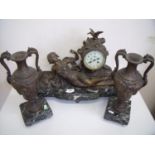 Late Victorian spelter and marble clock, set with enamel dial and mounted with a figure of a