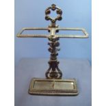 Cast metal two sectional stick stand with lift out tray to the base (width 41cm)