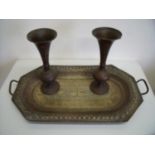 Rectangular twin handled Indian style brass tray with embossed detail and a pair of flared top vases