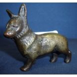 Small cast bronze figure of a corgi type dog (5cm high)