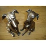 Pair of gilt composite figures of seated lurcher type dogs (30cm high)