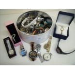 Box containing a large selection of various ladies and gents wrist watches including a boxed