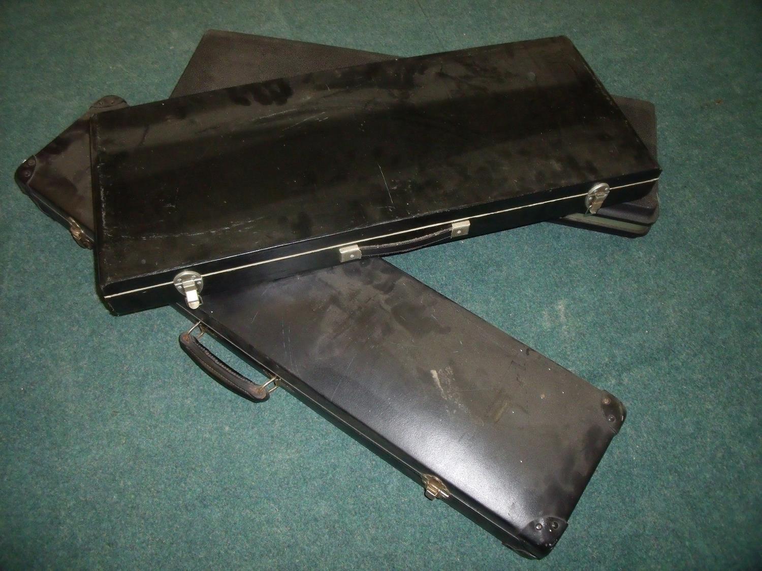 Three assorted gun cases