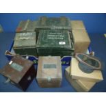 Selection of military surplus items including wooden cased supply units, cardboard case circa