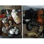 Selection of various decorative figures of cats and other wildlife animals in two boxes