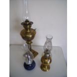 Brass oil lamp on Corinthian column and three others