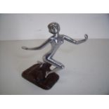 Circa 1920 chrome figure of a nude lady mounted on a carved base (height 12cm)