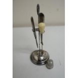 Silver hallmarked manicure stand with file and cutter, hat pin and silver hallmarked thimble