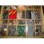 Multi-sectional drawer containing a large quantity of various OO gauge railway accessories including