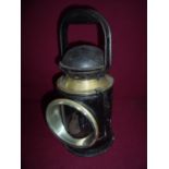 Railway hand lamp with brass mounts and coloured filters