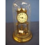 400 day brass clock with white enamel dial under glass dome (30cm high)