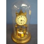 400 day brass clock with enamel dial under glass dome (33cm high)