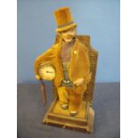 Unusual early 20th C automaton clock in the form of a whistling gentleman (37cm high)