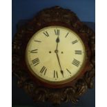 Victorian mahogany cased double fusee wall clock with a elaborately carved case and striking