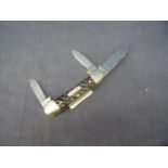 Rogers Wostenholm of Sheffield triple bladed pocket knife with two piece antler grips, with inset