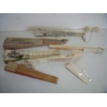 Large selection of various assorted fans, including Oriental, bone spines, faux ivory, Mother of