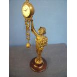 19th/20th C French bronze Mystique clock in the form of a boy selling onions (38cm high)