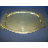 Art Nouveau oval brass tray, the central panel with hammered detail (51cm x 32cm)