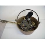 Brass jam pan with swing handle, various other brass ware including candlesticks, toasting forks,
