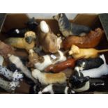 Large selection of various assorted ceramic figures of dogs, including Beswick Labrador, Beswick Red