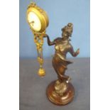 Early 20th C Spelter Mystique clock in the form of a semi-clad lady (34cm high)