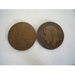 Mistriked George VI copper penny coin with partial date showing and a George V double headed coin (