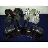 Pair of early 20th C onyx bookends mounted with spelter figures of fox terriers, a pair of