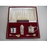 Cased Birmingham silver hallmarked cruet set