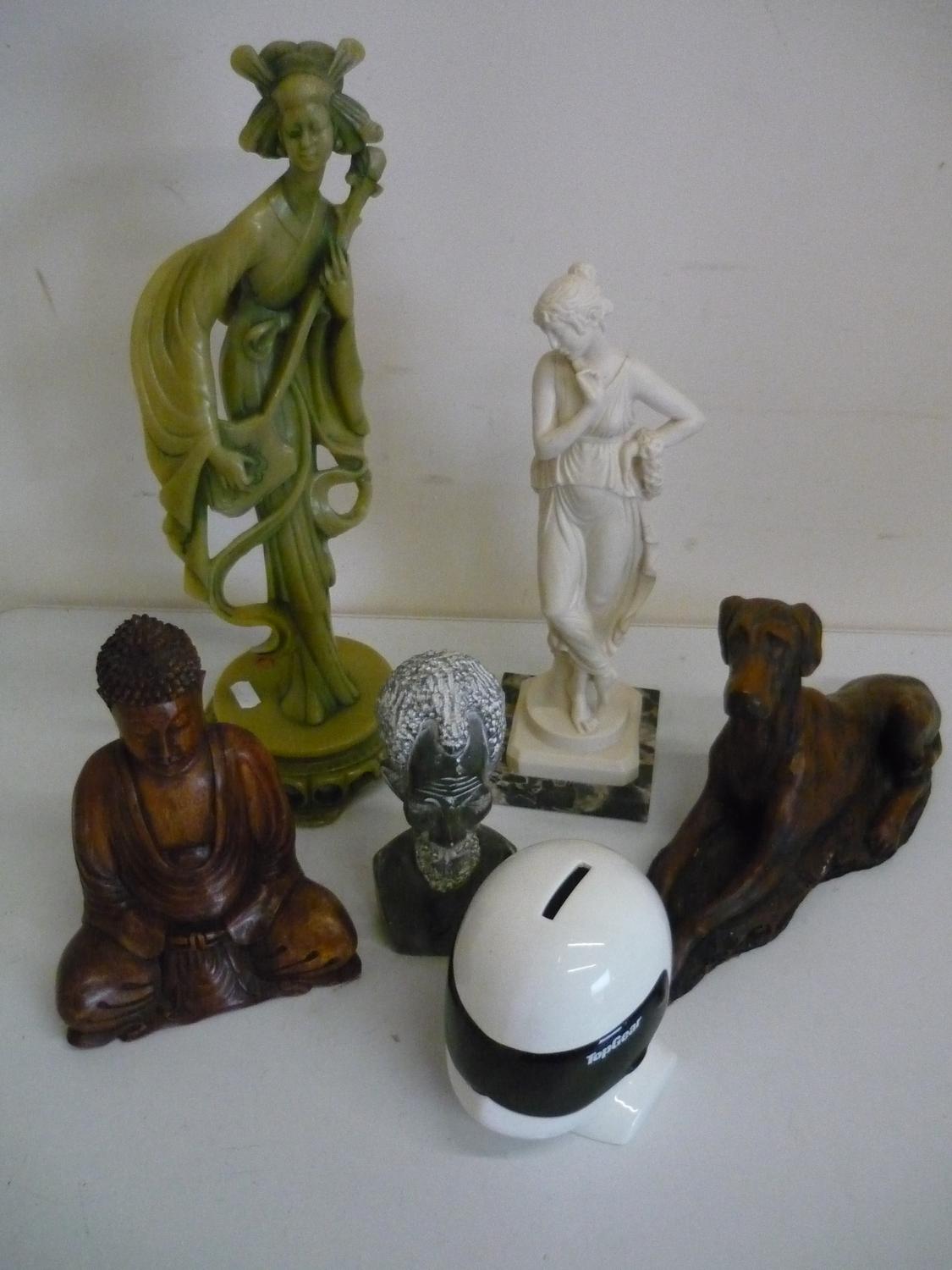 Soapstone African carved head, a Stig money box, carved wooden Buddhist figure and a carved figure