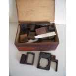 19th C stained pine box containing a large quantity of various wood and metal printing blocks and