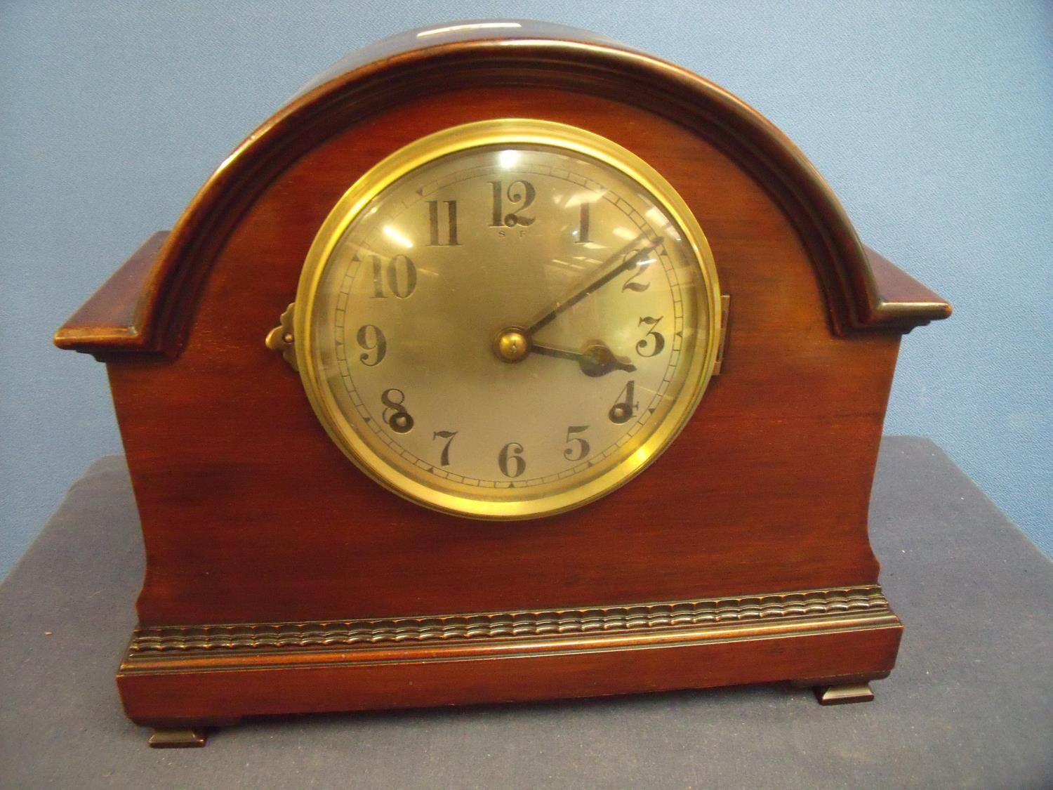 Early 20th C mahogany cased arched top mantel clock with brass dial and chiming movement