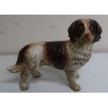 Heavy cast metal figure of a spaniel type dog (height 20cm)