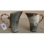 Pair of early-mid 20th C cows horn beakers with shaped bamboo handles