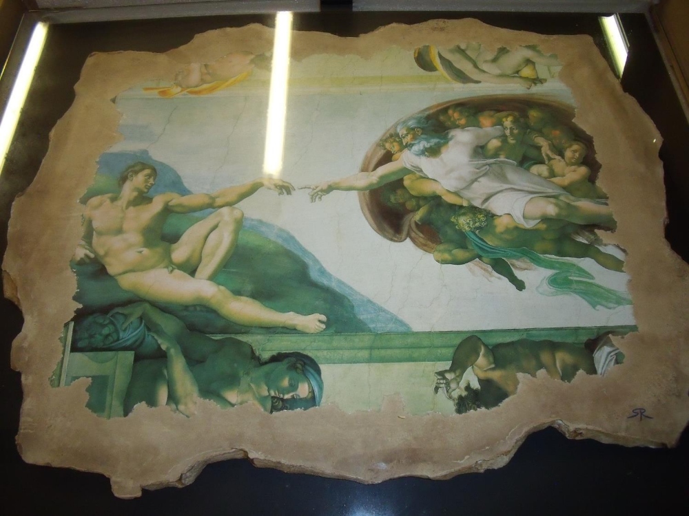 Boxed reproduction Michael Angelo La Creazione painted plaster panel mounted on board with glazed