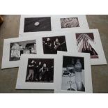 A group of seven mounted photographic style prints of various objects including pebble on the beach,