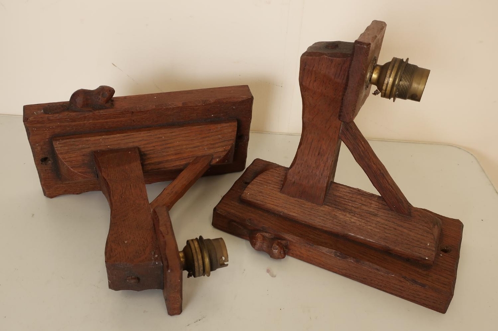 Pair of Whitaker of Sutton Under Whitestonecliffe (Beaverman) carved oak wall lights