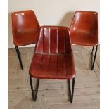 A matching pair and another similar vintage leatherette covered chairs (3)