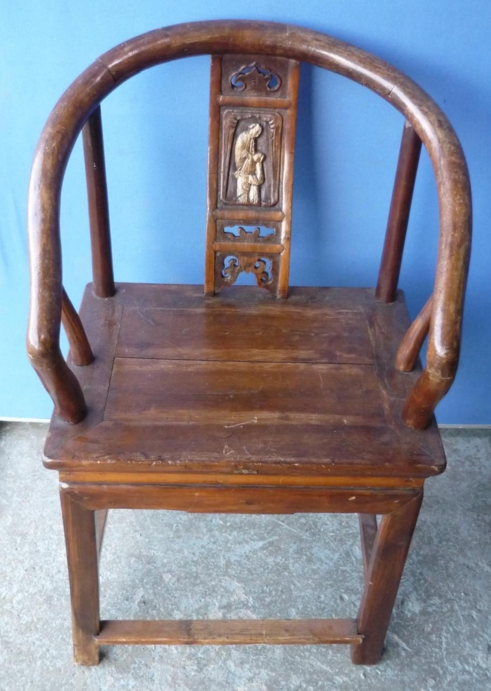 19th/20th C Chinese hardwood armchair with carved detail and gilt panel to the back