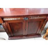 Late Victorian mahogany side cabinet with single drawer above two panelled cupboard doors with