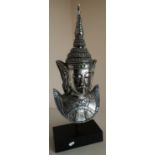 Mounted bust of Thai style deity in silver coloured and sequin finish (height 60cm)