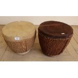 Pair of African style tribal drums finished in animal skin with rope decoration