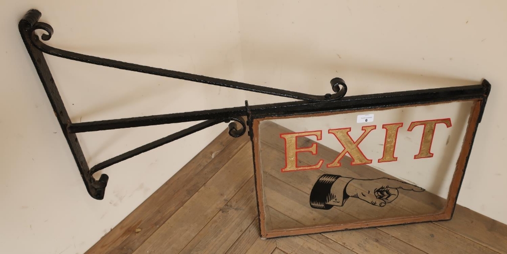 Early 20th C glass theatre 'Exit' sign, with wrought iron bracket