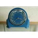 Early to mid 20th C blue painted wind up mantel clock