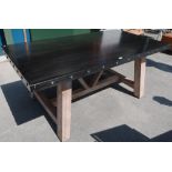 Contemporary industrial style pine framed kitchen table with painted top on limed pine trestle
