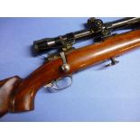 Konigsberg 7.62 bolt action rifle with heavy barrel and bipod mounting slide, with pistol grip and