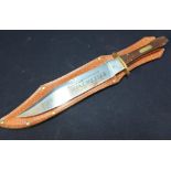 Winchester advertising Bowie type knife with 8 1/2 inch blade stamped with skull and bones, and