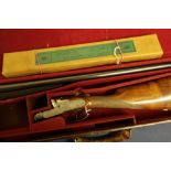 Cased 12 bore side by side shotgun by Henry Tolley and Co with 25 inch barrels, side plated